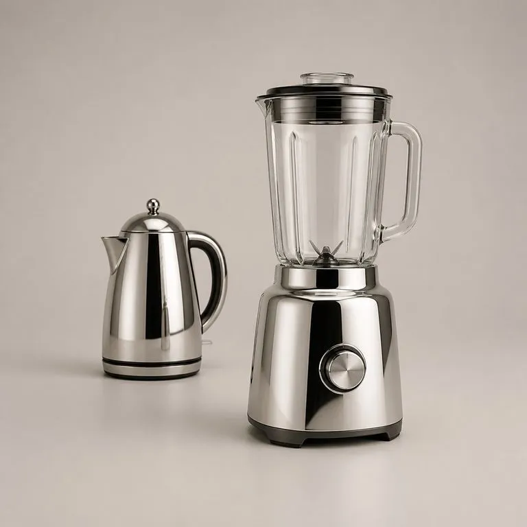 A polished chrome kettle used as a material reference beside a blender rendered in the same chrome finish