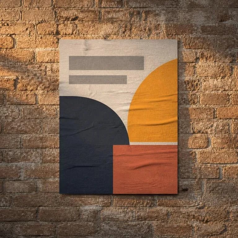 A poster pasted flush on brick with warm low sun raking across the paper